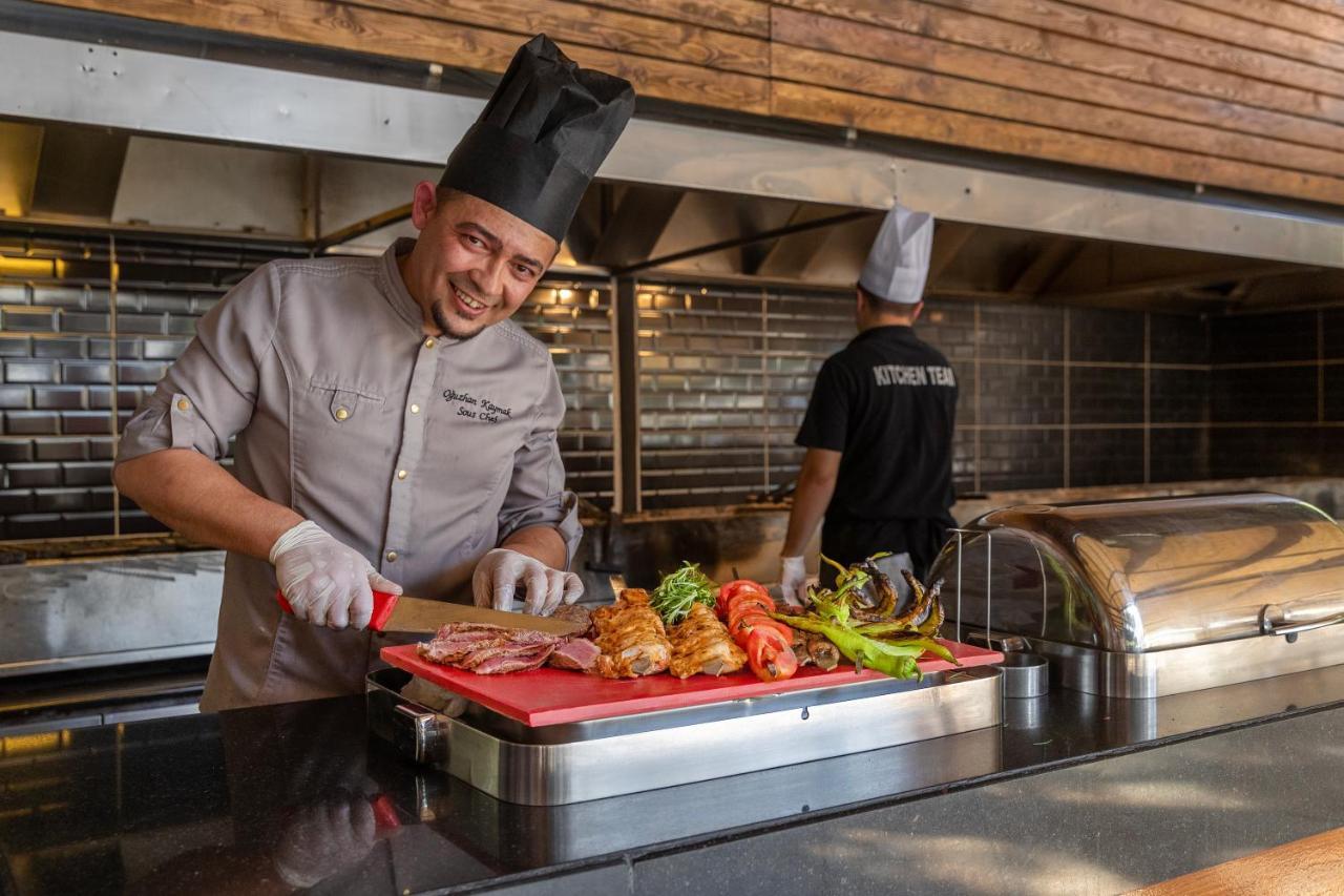 Marti Myra Hotel Tekirova Exterior photo A chef preparing food